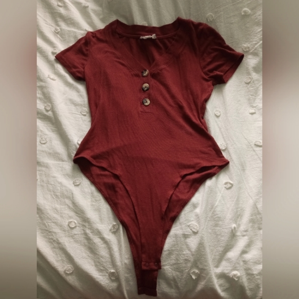 Pink Rose Burnt Orange Rib-Knit Button Up Bodysuit. Size Medium.